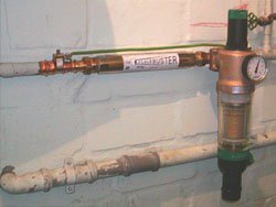 Sacrifical anode corrosion limescale protection