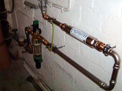 Sacrifical anode corrosion limescale protection